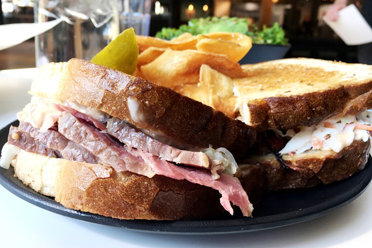 A Reuben with housemade potato chips, which aren't available at Rye Society's Denver deli. - MARK ANTONATION