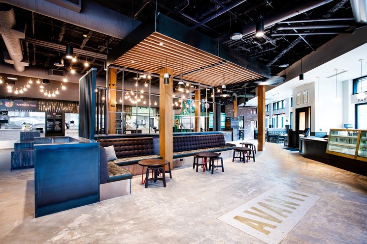 The main floor of Avanti Boulder holds Method Coffee Collective, five food vendors and a bar. - WERK CREATIVE