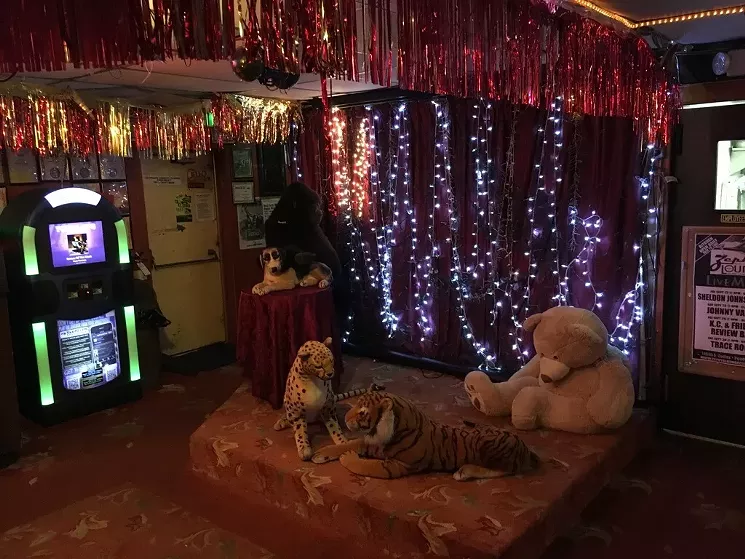 A menagerie of oversized stuffed animals combined with the lights and streamers on the Zephyr Lounge karaoke stage. - NATASHA KERR