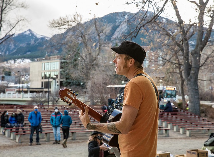 Clay Rose of Gasoline Lollipops performing a benefit for the homeless as part of his Tuesday series at the Boulder Bandshell. - BACKSTAGE FLASH
