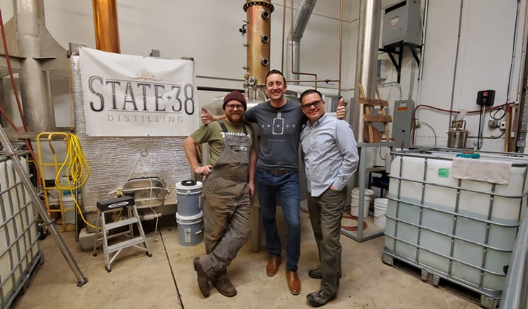 Distiller Joel Randall and owners Sean Smiley and Don Hammond at State 38 Distilling in Golden. - LINNEA COVINGTON