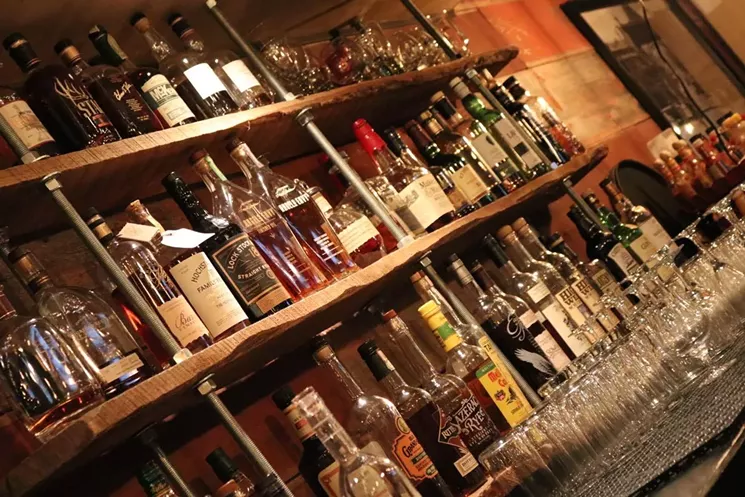 Grind's regular customers took advantage of relaxed liquor regulations early in the pandemic to purchase bottles of wine and liquor to go. - COURTESY OF GRIND KITCHEN + WATERING HOLE
