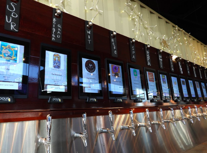 The indoor pour-your-own tap system at Stanley Beer Hall. - POURMYBEER