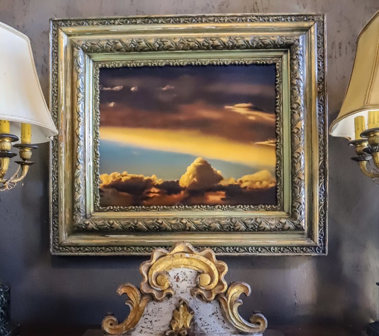 Meteorogical photographer Dianne Allison mixes up her works with Eron Johnson's antiques. - DIANNE ALLISON