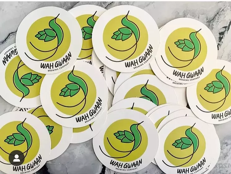 The brewery's logo is a mashup of hops and a swallow-tailed hummingbird — known as the Doctor Bird — which is the national bird of Jamaica. - COURTESY OF WAH GWAAN BREWING