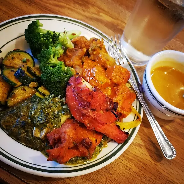 The buffet may be gone, but the individual dishes are great at Yak & Yeti. - GIL ASAKAWA