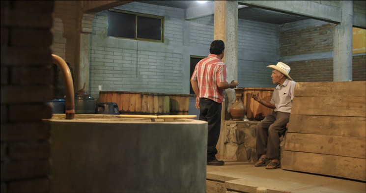 Don José Cortés, seated, comes from a long line of mezcaleros who have been making the spirit in Santiago Matatlán, Mexico, since 1840. - STILL FROM SONS OF MEZCAL, JACKSON EAGAN, CINEMATOGRAPHER