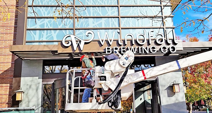 The sign is installed at Windfall Brewing. - WINDFALL BREWING