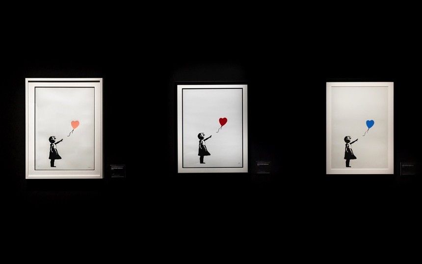 Art of Banksy carries three copies of his work, "Girl With Balloon." - KYLE FLUBACKER