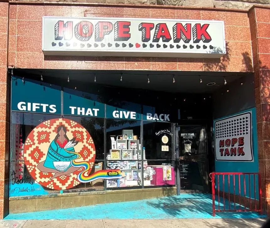 The late Alicias Cardenas painted this mural on Broadway, right by her own Sol Tribe tattoo spot. - ERIKA RIGHTER