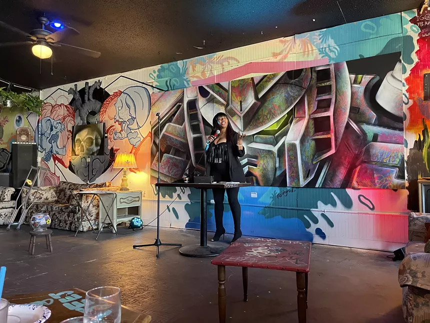 Bedroom Kandi rep GeeGee Norah Stephens gives an interactive presentation during E'Toi's last LUST show. - CLEO MIRZA