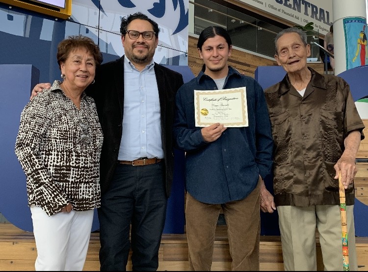 Enrique Benavidez received an award alongside the Chicano Studies Department. - ENRIQUE BENAVIDEZ