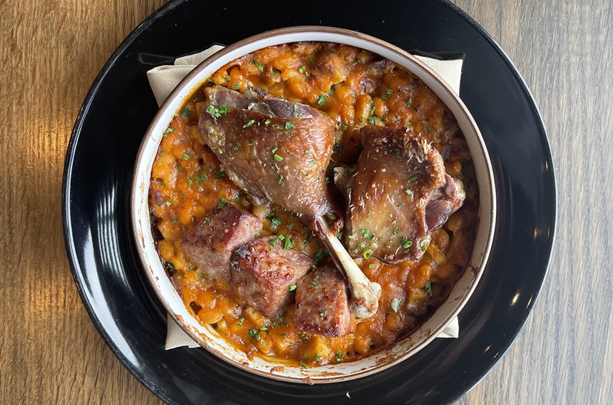 Canard cassoulet at Le French consists of  confit duck leg, stewed white beans, pork sausage and pork belly. - LE FRENCH
