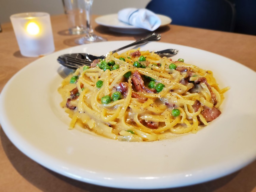Food is served family-style at both Carmine's locations. - MOLLY MARTIN