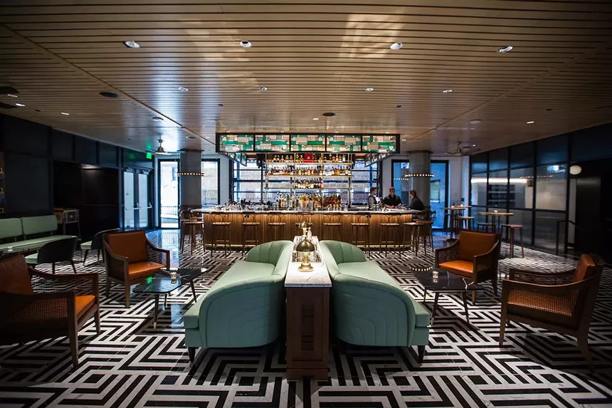 Enjoy the glam mint-green accents and mint julep bar at Poka Lola. - DANIELLE LIRETTE