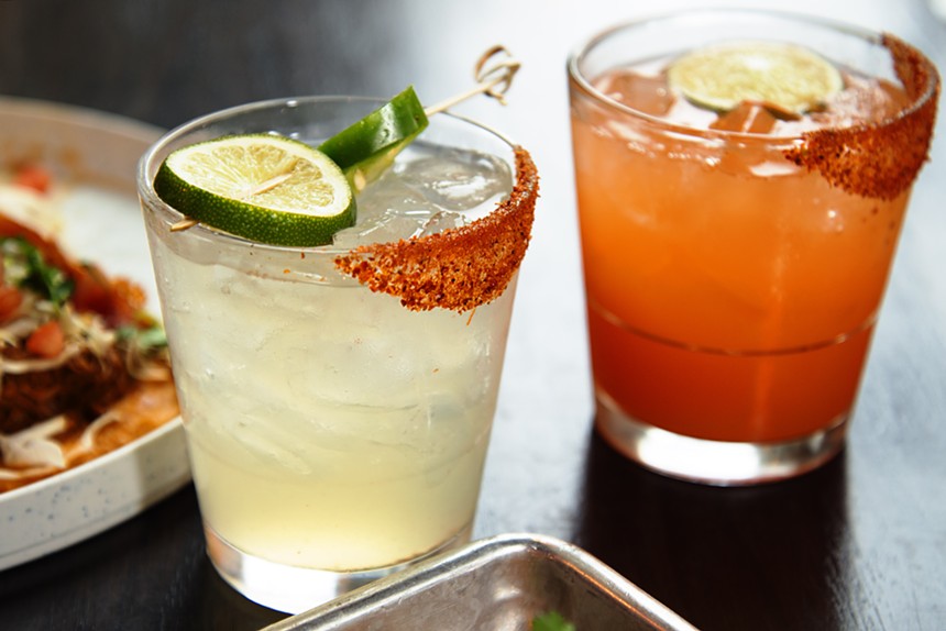 The jala-piña, left, and the carrot mole margaritas were crafted with help from bar manager, Daniel Farias. - TOM HELLAUER