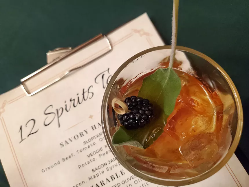 12 Spirits Tavern has a concise menu of cocktails and snacks. - MOLLY MARTIN