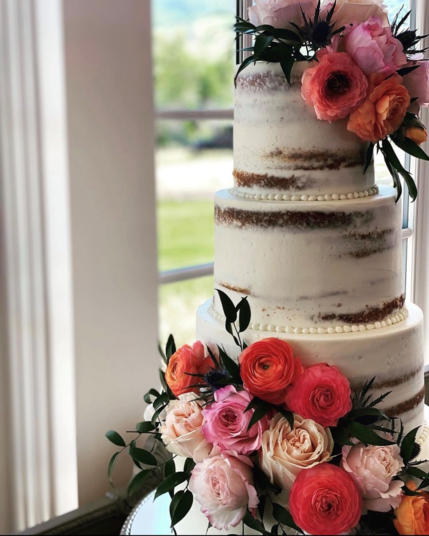 A semi-naked cake created for a wedding at The Manor House in 2021. - MICHELLE HADDEN-WEEKLEY