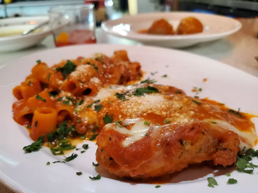 chicken parm and pasta on a plate