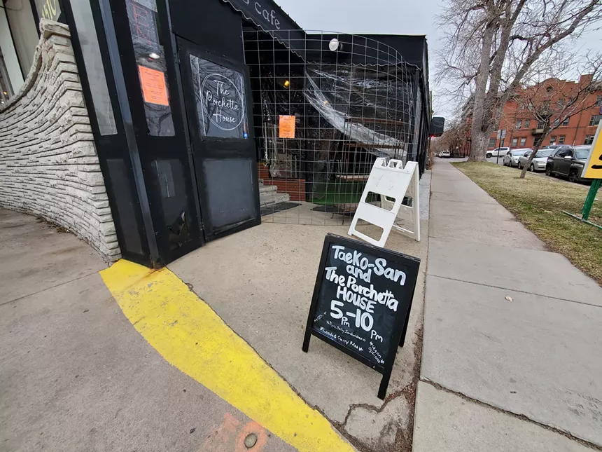 sign in front of cafe