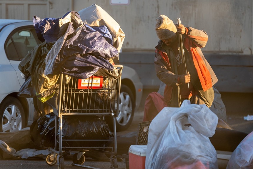homeless encampment sweep worker denver