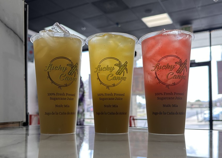 three cups of sugarcane juices with the lucky canes logo