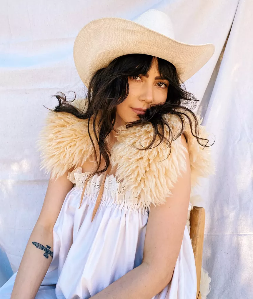 woman in a cowboy hat