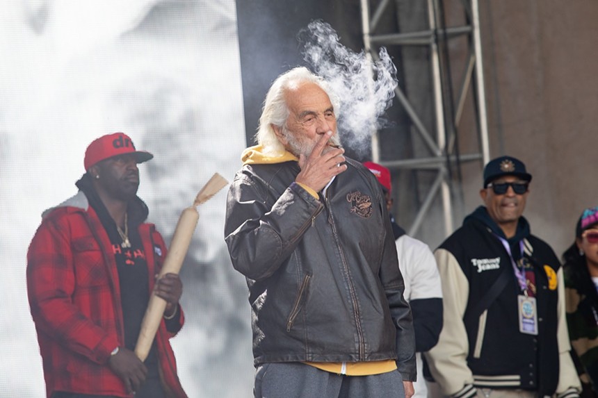 Tommy Chong smoking a joint