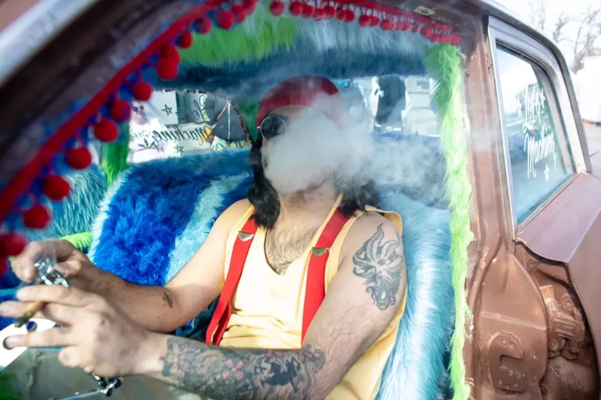 Cheech Marin and his car at the Denver 4/20 fest