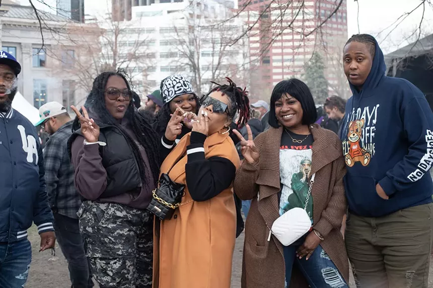 The crowd lights up at the Mile High 420 Festival