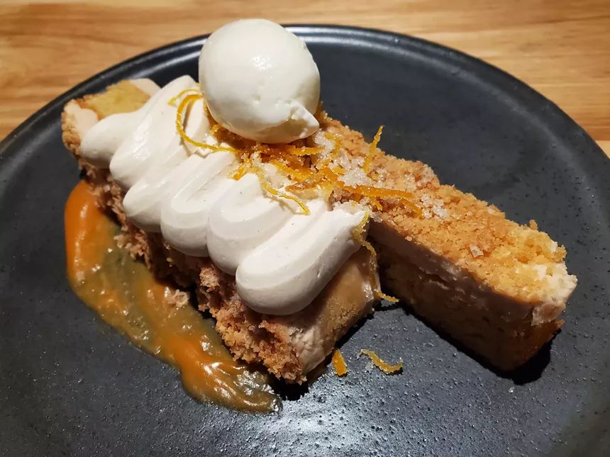 a slice of cake with cream