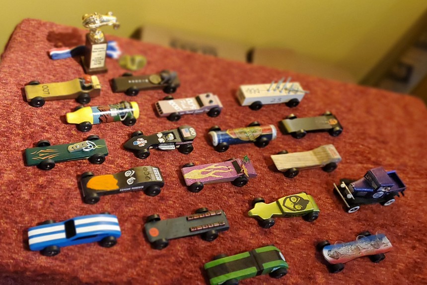 A display of pinewood derby cars