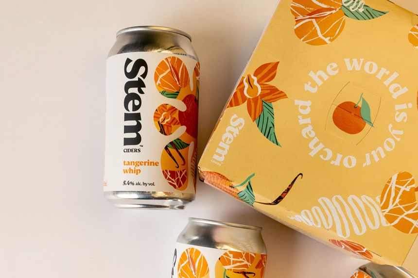 Cider can with tangerine on the label.
