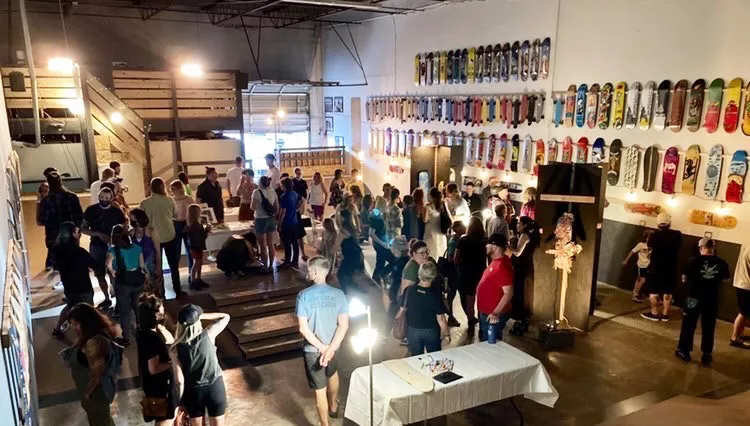 people mingling at an art show