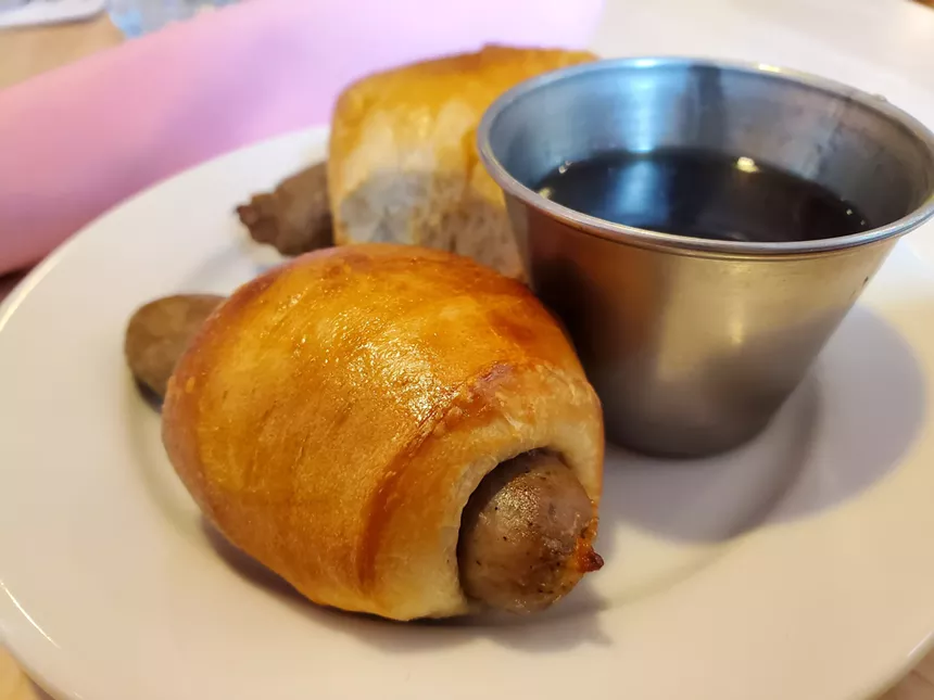 a breakfast sausage wrapped in dough