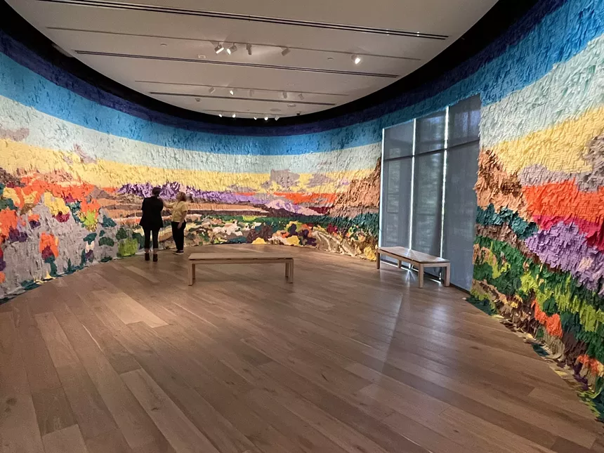 an indoor mural of southwestern landscape