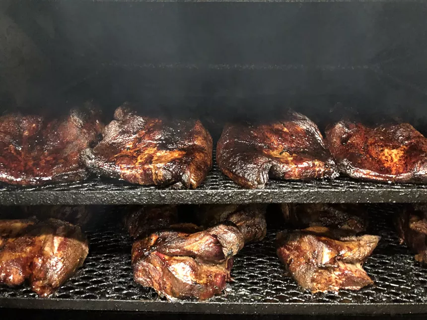 meat in a smoker