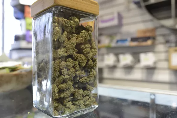 A jar of weed inside of a Denver dispensary