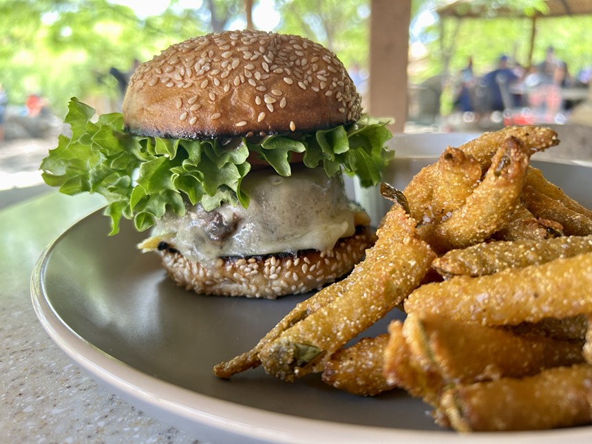 A mushroom Swiss burger and pickle fries