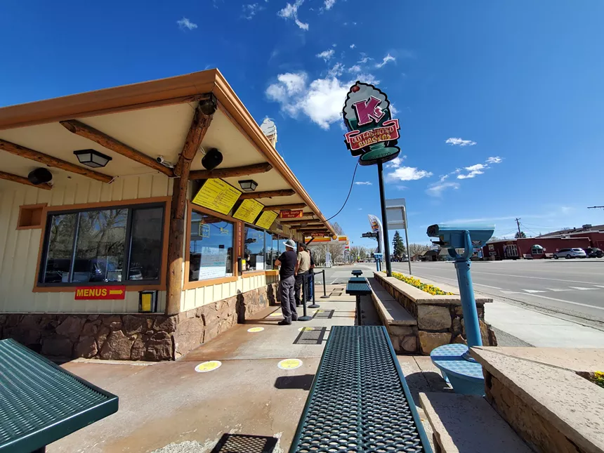 an ice cream stand on a sunny day