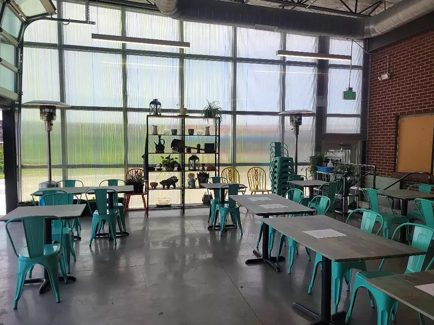 sunlit seating area with dining tables