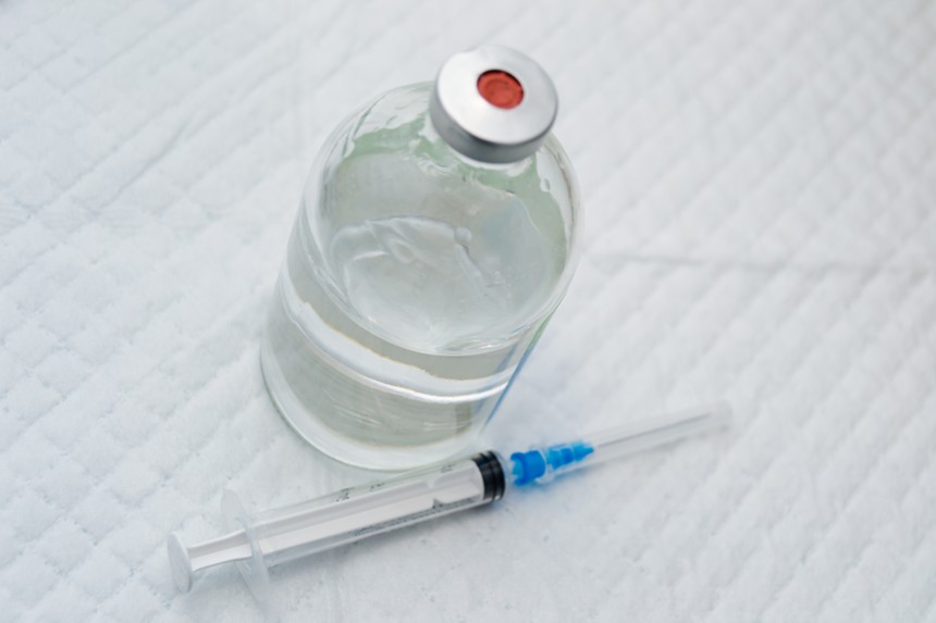 bottle of drug with syringe
