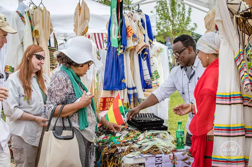 A vendor selling Ethiopian jewelry and apparel