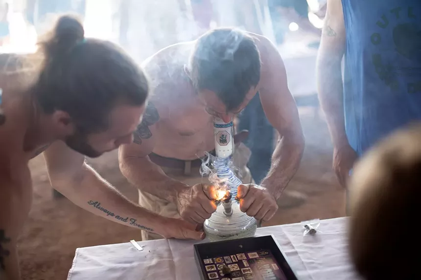A man smokes weed in a competition
