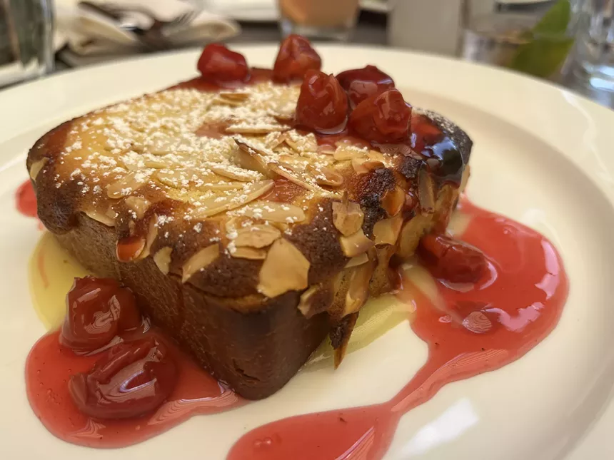 a sweet french bread with cherries and almonds