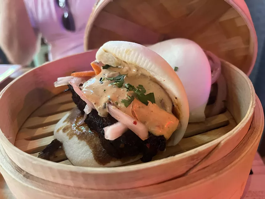two boa buns in a basket