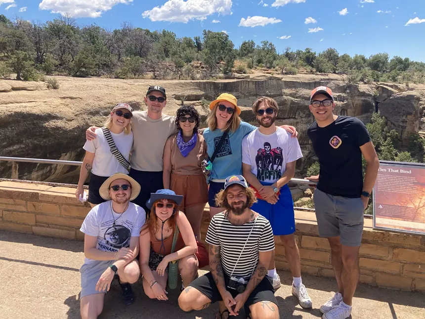 nine people in shorts and sunglasses outside in Colorado