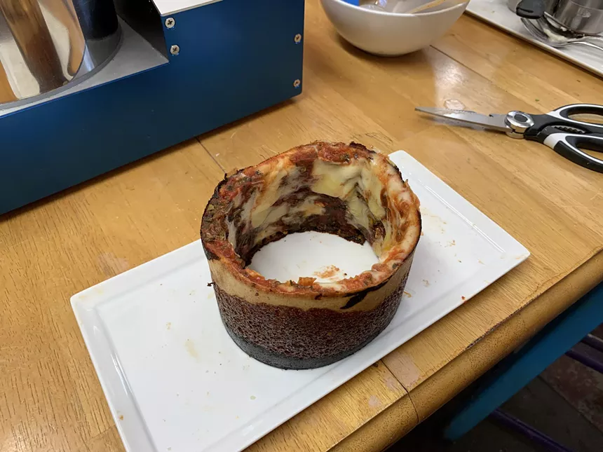 a cylinder-shaped pizza