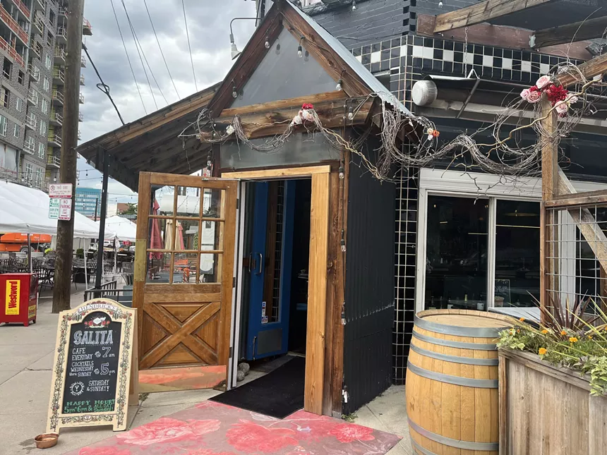 the front door of a bar