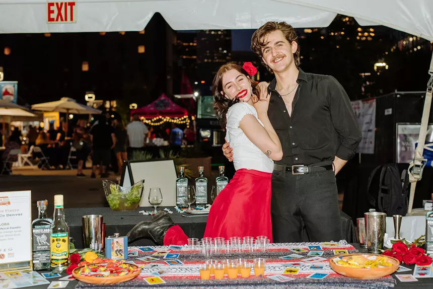a man and a woman at an outdoor festival